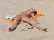 Gorgeous hardbody nude sunbathing
