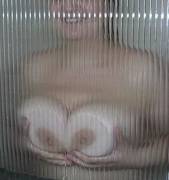 My wife pressing some glass