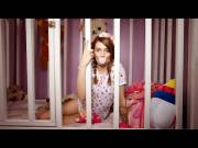 Woman living as an adult baby.